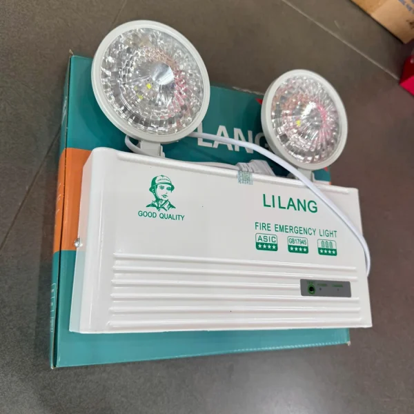Đèn sự cố Lilang 2 mắt vỏ trắng Fire Emergency Light có nút TEST – ảnh thực tế tại Thietbi114
